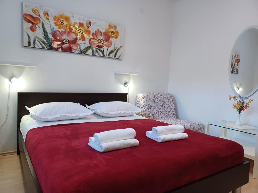 Posteľ alebo postele v izbe v ubytovaní MG Ravlic Apartments