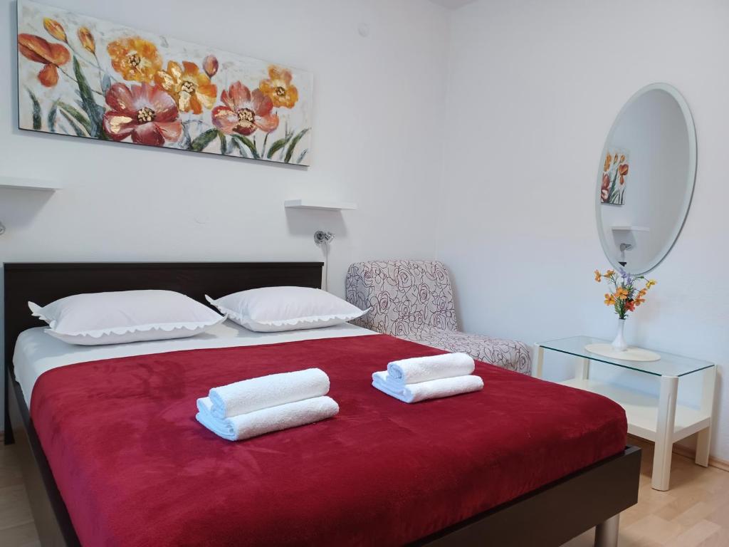 Posteľ alebo postele v izbe v ubytovaní MG Ravlic Apartments