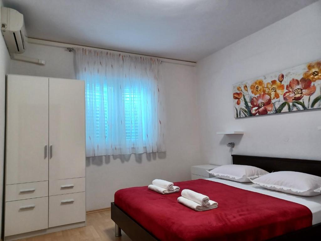 Posteľ alebo postele v izbe v ubytovaní MG Ravlic Apartments