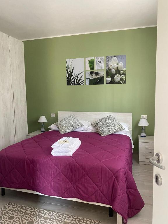 Posteľ alebo postele v izbe v ubytovaní Corte 22 B&b e Appartamenti