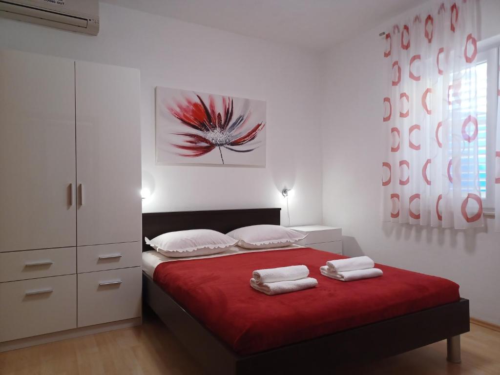 Posteľ alebo postele v izbe v ubytovaní MG Ravlic Apartments