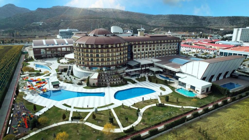 an aerial view of a large building with a pool at Akrones Thermal Spa Convention in Afyon