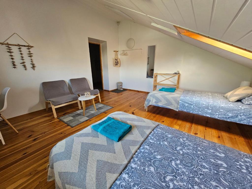 Postel nebo postele na pokoji v ubytování Surf Inn