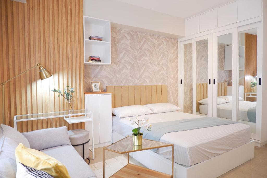 Postel nebo postele na pokoji v ubytování Hotel Vibe in Manhattan Plaza, Araneta City, Cubao