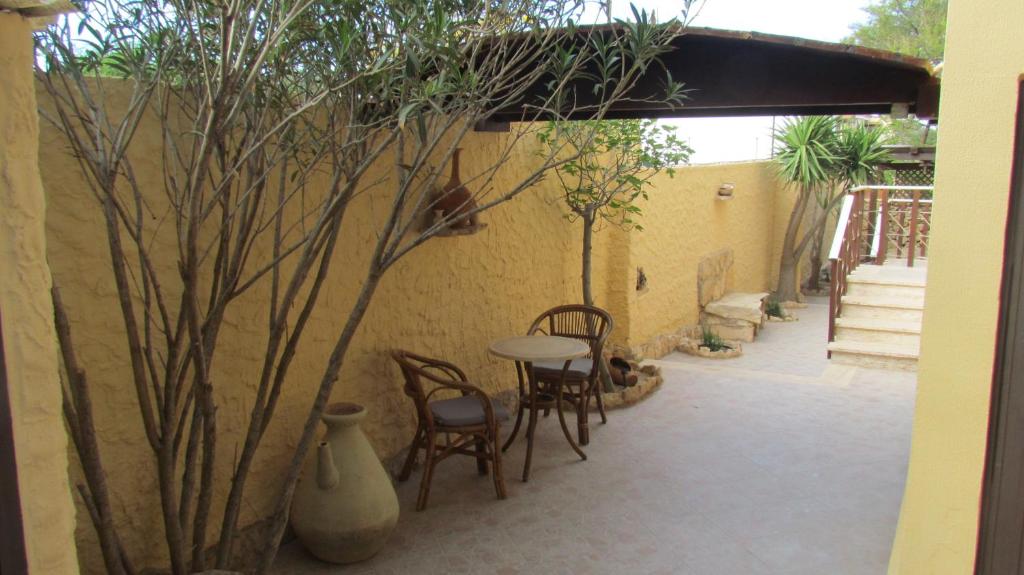 A patio or other outdoor area at Le Anfore Hotel - Lampedusa
