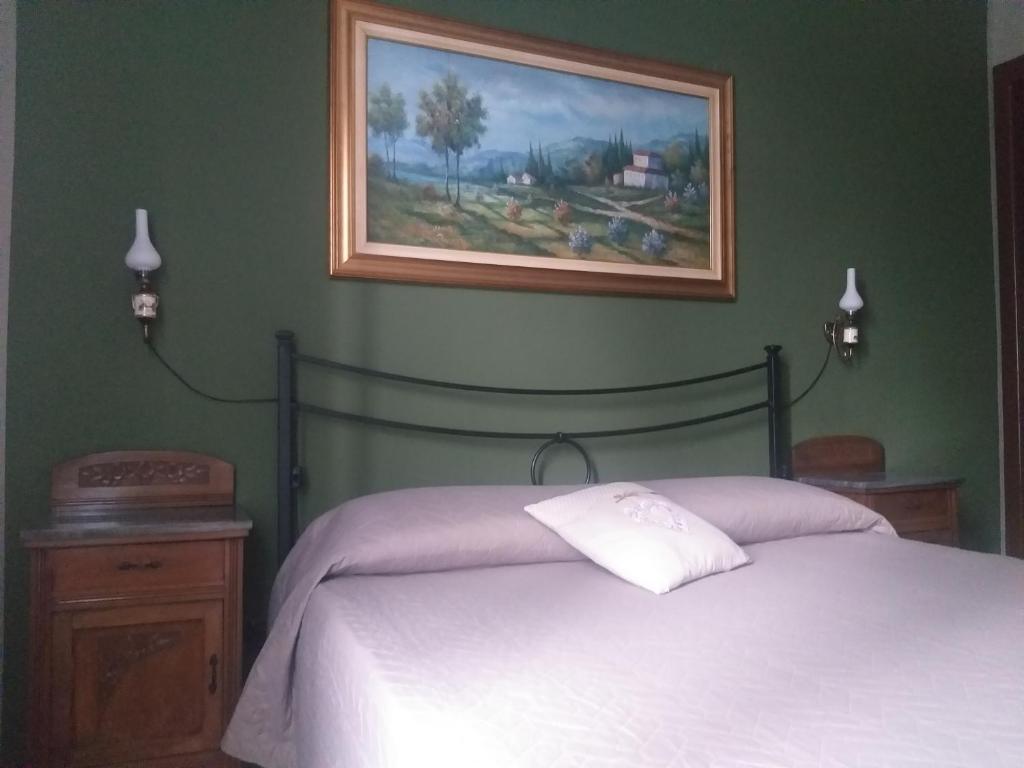 Säng eller sängar i ett rum på Mosci's Bed & Breakfast