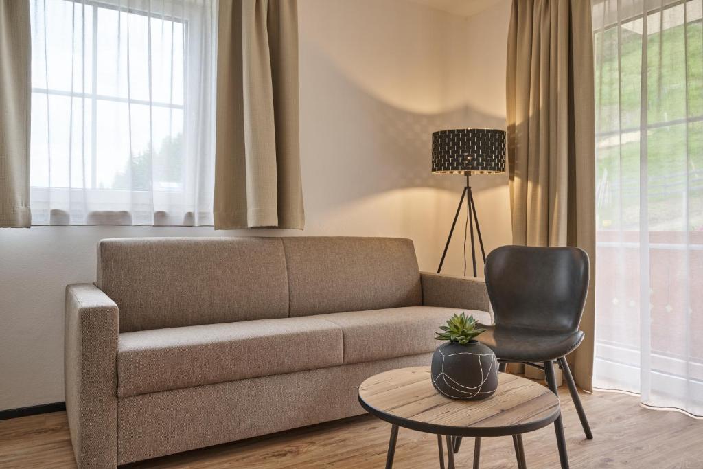 Posezení v ubytování Alpendorf Hotel Stern