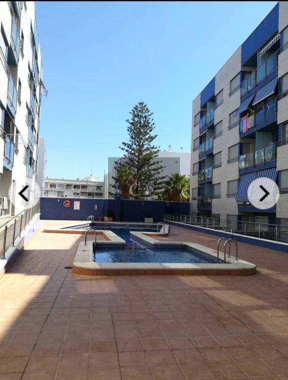 Bazén v ubytovaní PMT11 - Beach location and pool alebo v jeho blízkosti