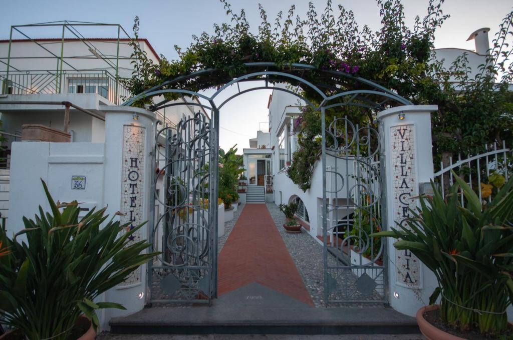 an entrance to a house with an iron gate at Hotel Villa Cecilia in Ischia Town