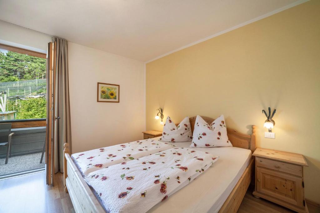 Postel nebo postele na pokoji v ubytování Langstein Wohnung Sonnenblume
