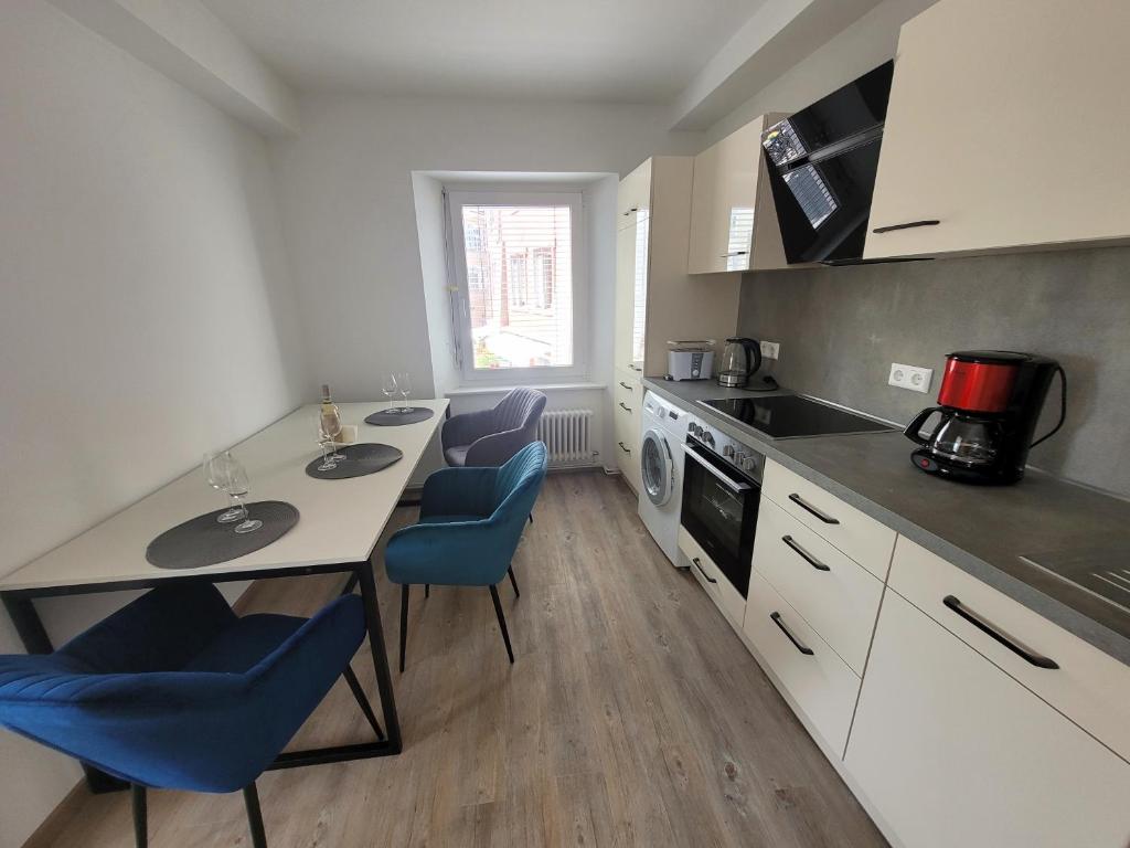 Kuchyň nebo kuchyňský kout v ubytování City-Apartments direkt am See - SEEBLICK!