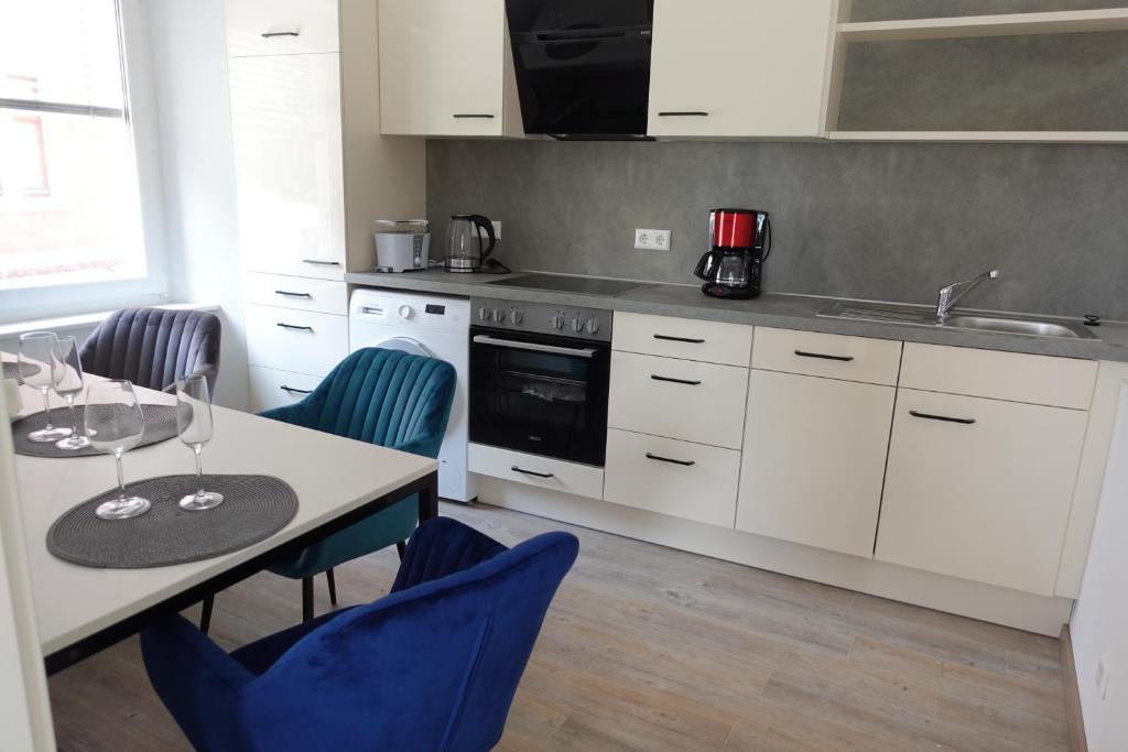 Kuchyň nebo kuchyňský kout v ubytování City-Apartments direkt am See - SEEBLICK!