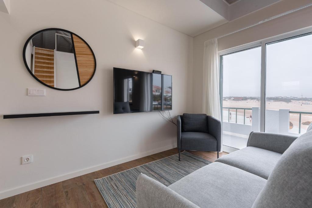 TV a/nebo společenská místnost v ubytování Casa da Rocha - Totalmente Renovada