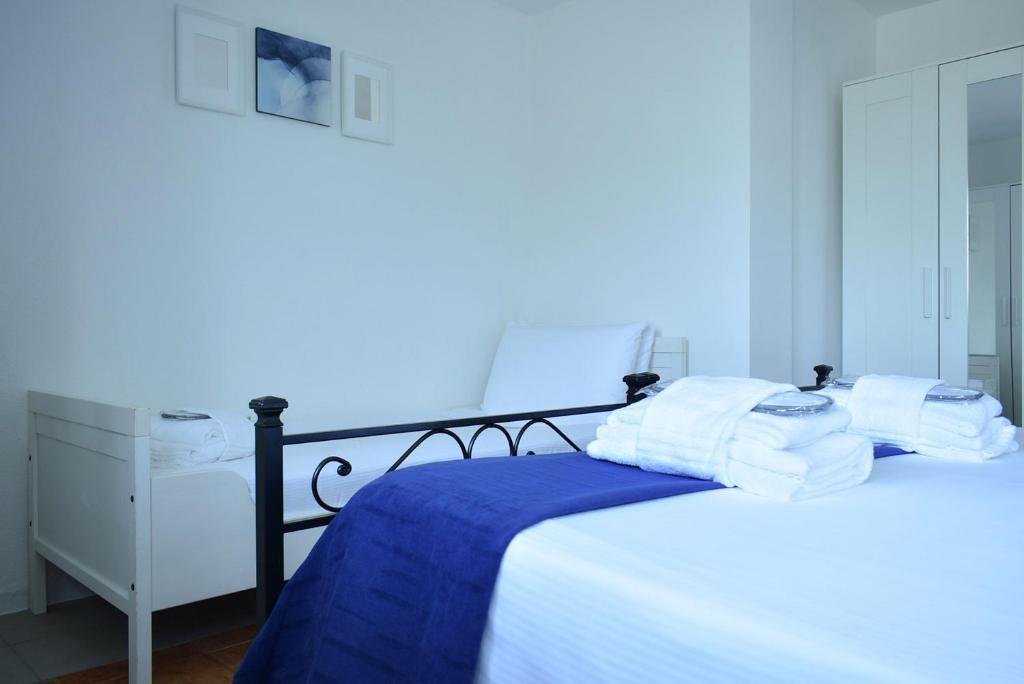 A bed or beds in a room at Eclectic Space Padova two apartments