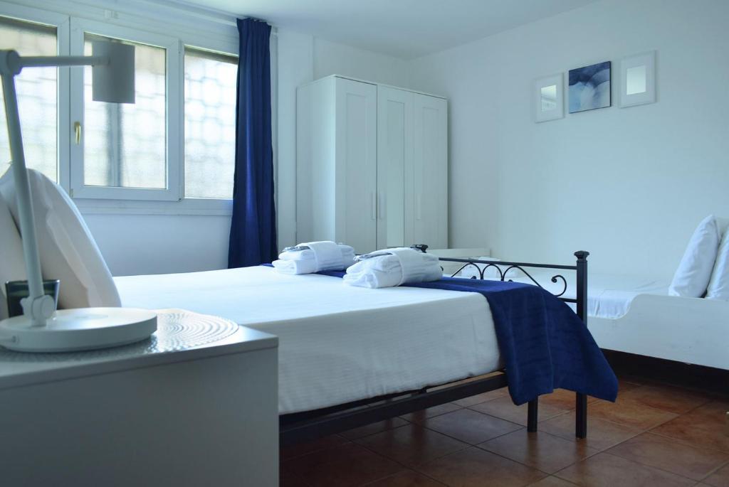 A bed or beds in a room at Eclectic Space Padova two apartments