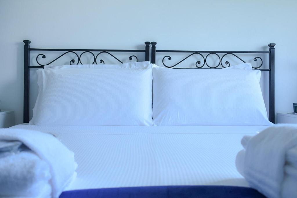 A bed or beds in a room at Eclectic Space Padova two apartments