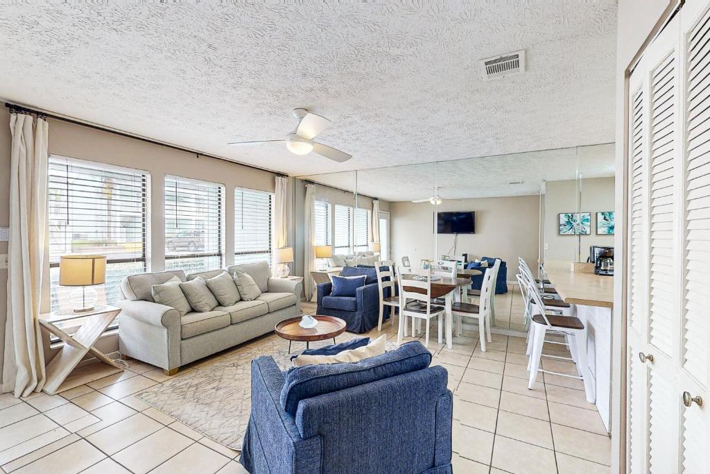 a living room with a couch and a table at Southwind C-2 in Panama City Beach