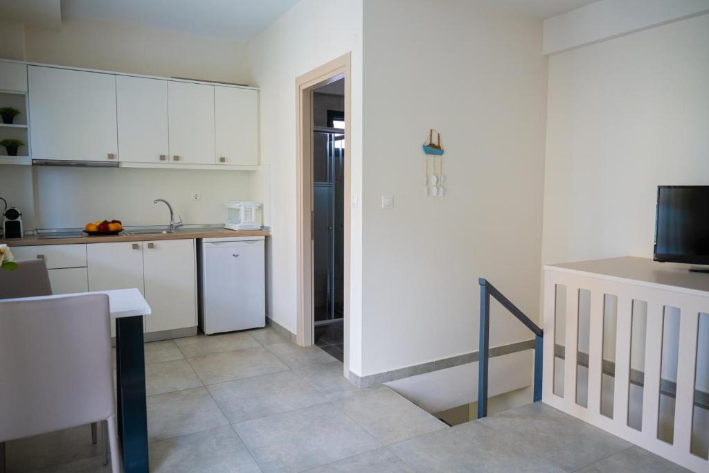 Kuchyň nebo kuchyňský kout v ubytování Callista Suites