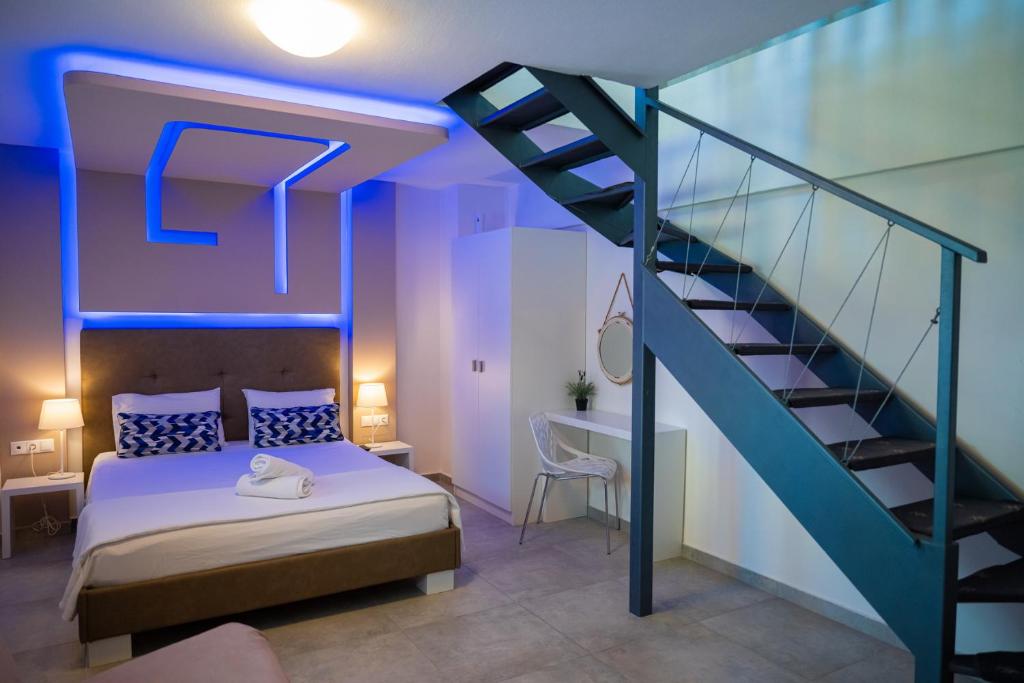 Postel nebo postele na pokoji v ubytování Callista Suites