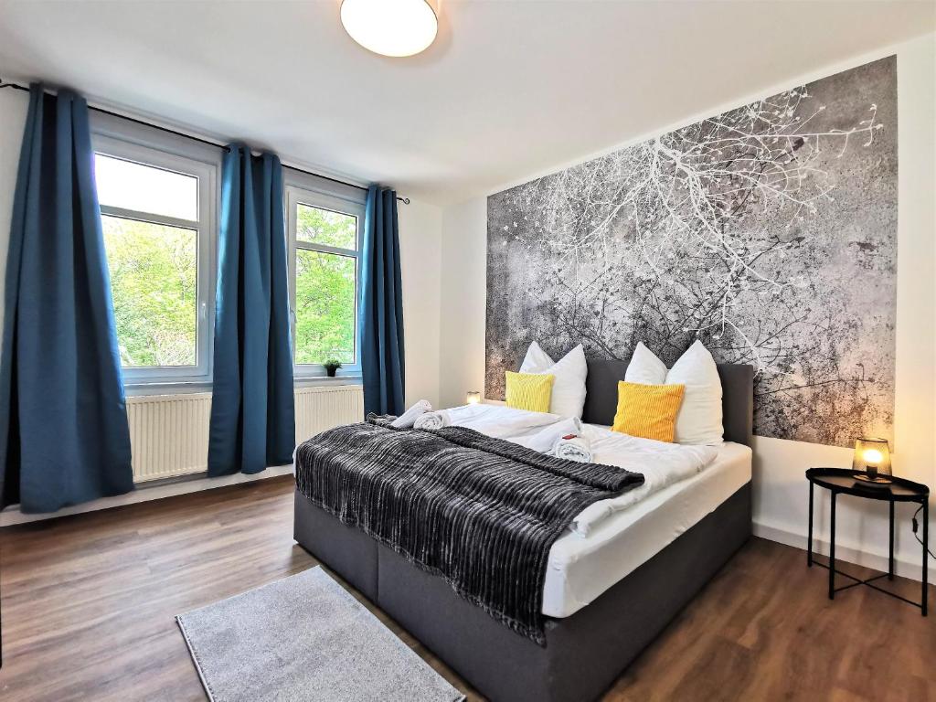 Voodi või voodid majutusasutuse BohnApartments Deluxe-Zechen-House-Family - 2 Balkone - gratis Parkplätze - WLAN toas