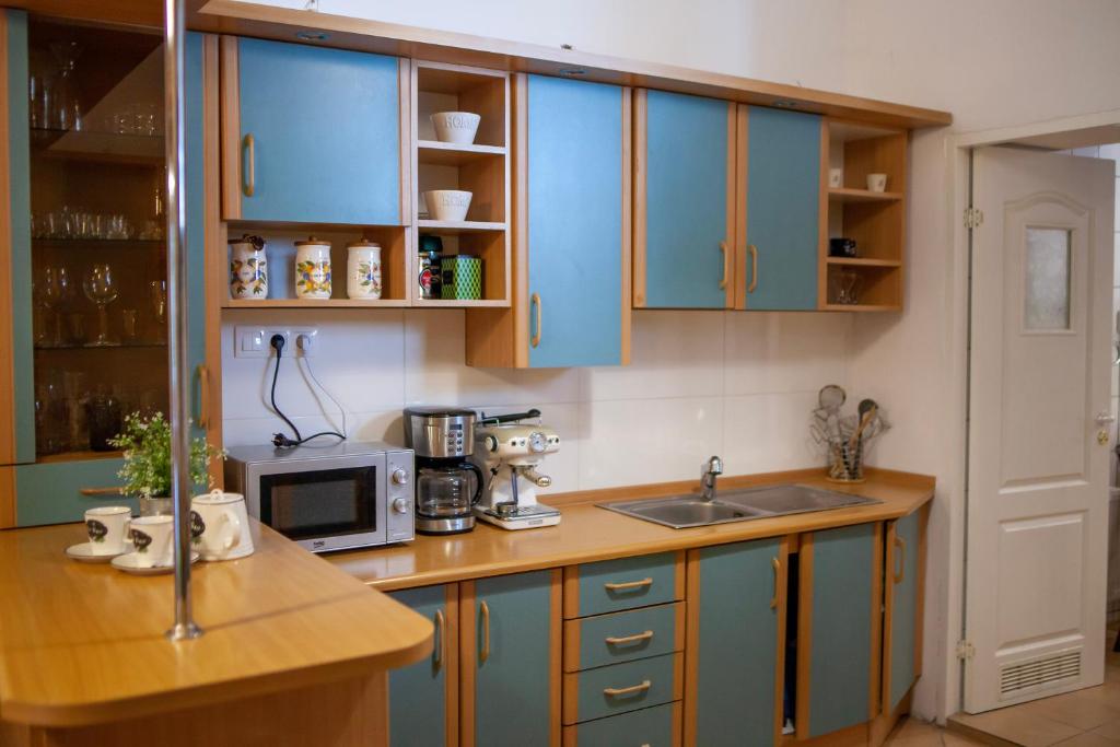 Kuchyňa alebo kuchynka v ubytovaní Bailey Apartment