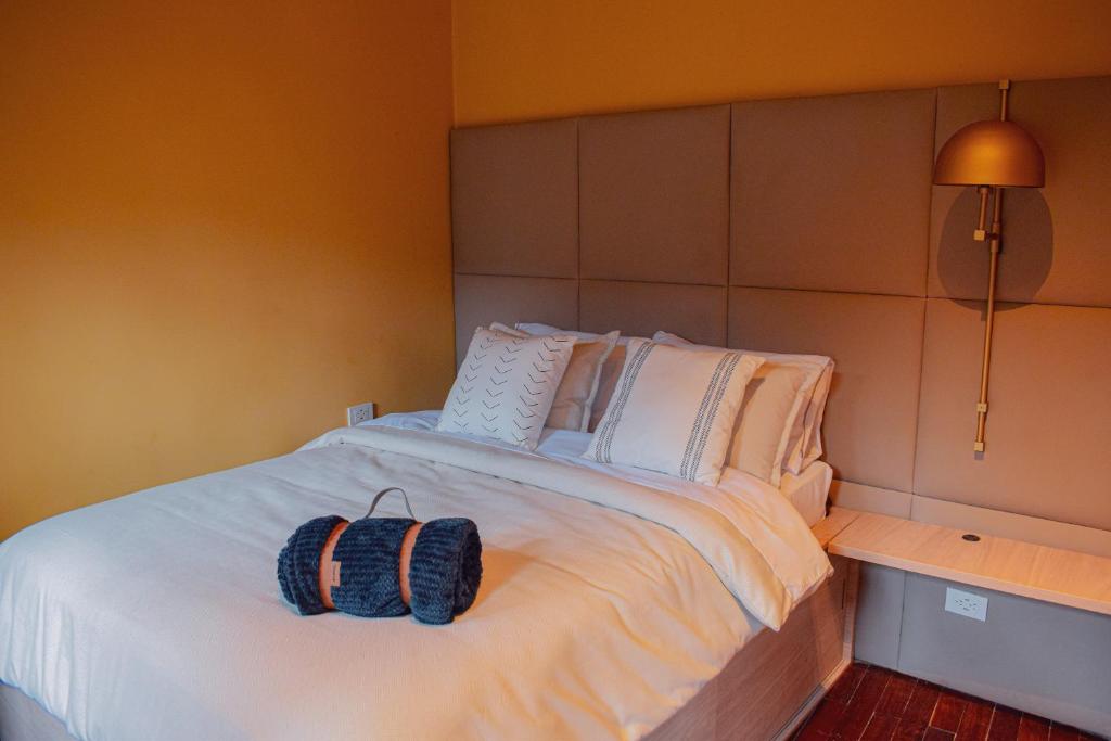 Postel nebo postele na pokoji v ubytování Casa Dreamer Bogotá