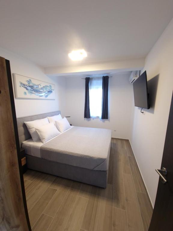Postel nebo postele na pokoji v ubytování Apartments Marebella