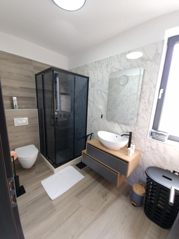Koupelna v ubytování Apartments Marebella
