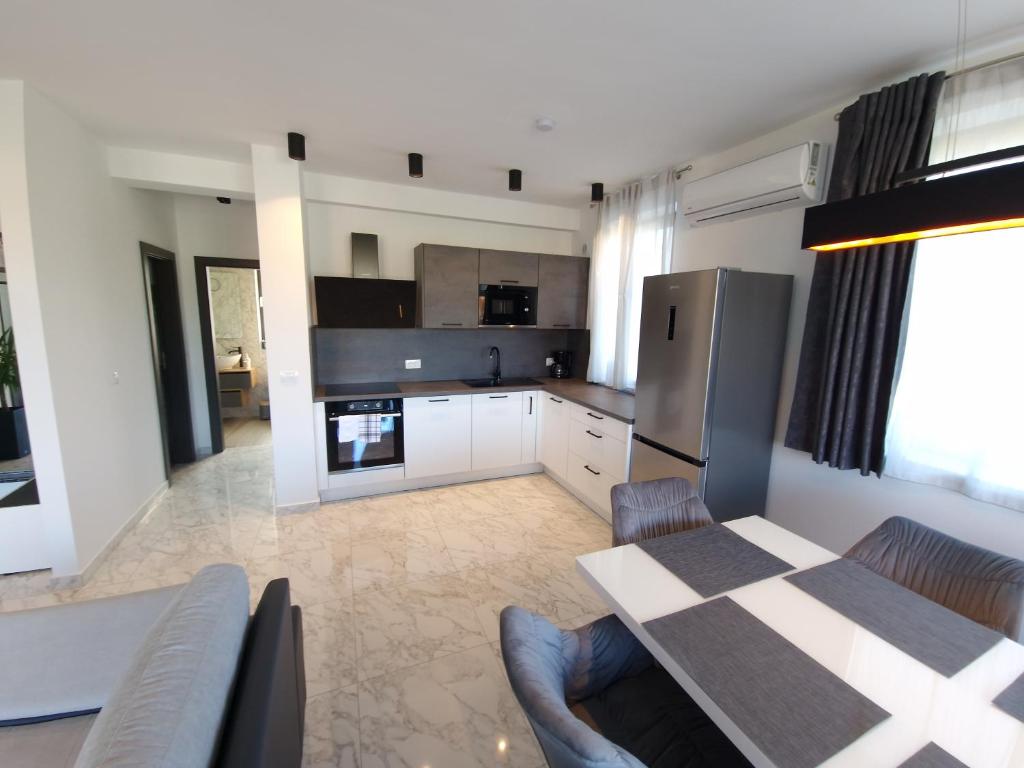 Kuchyň nebo kuchyňský kout v ubytování Apartments Marebella