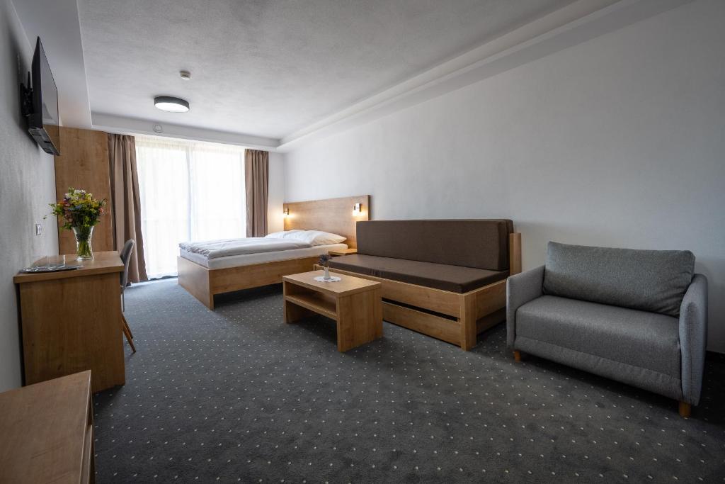 Letto o letti in una camera di Berg Liptov