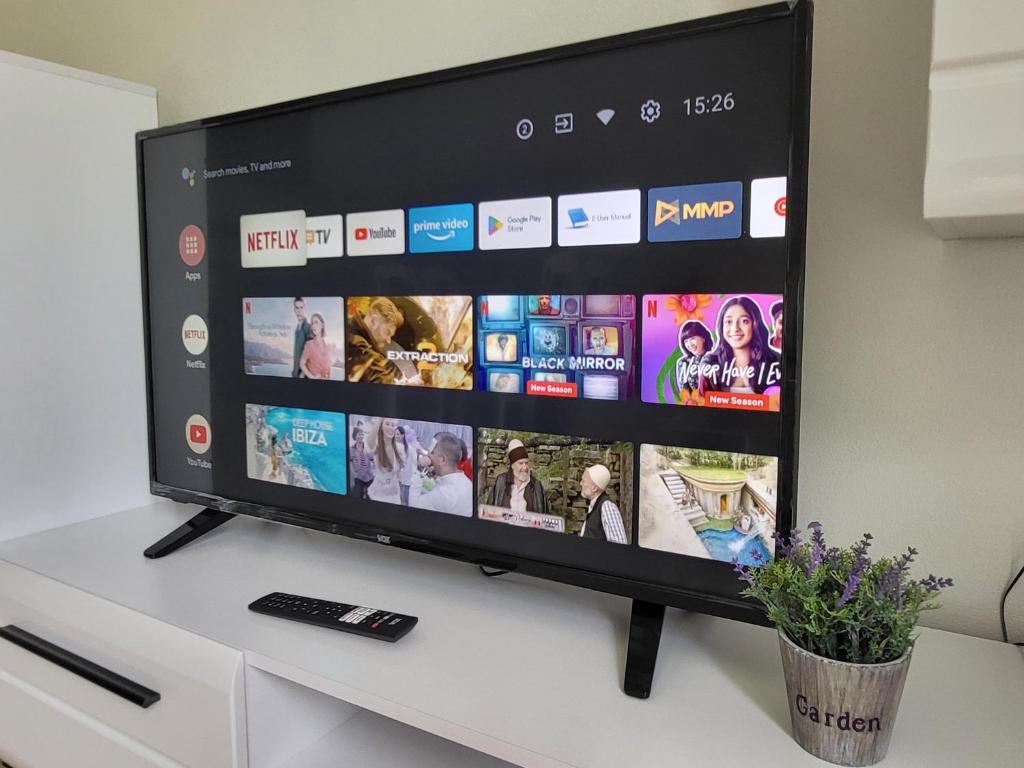 TV a/nebo společenská místnost v ubytování Novi Relax apartment
