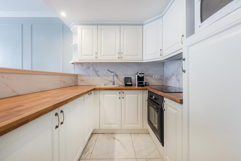 Queen's Court Hotel & Residence - Resim 32