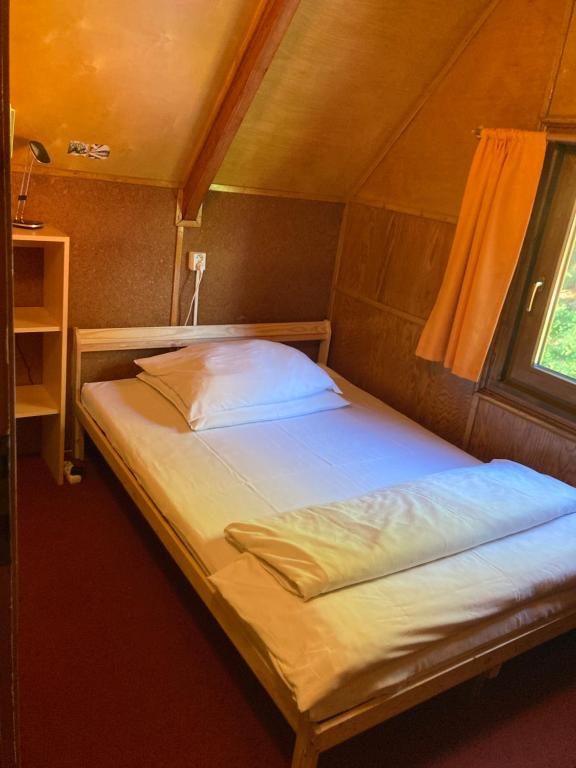 Postel nebo postele na pokoji v ubytování Chaty Marta