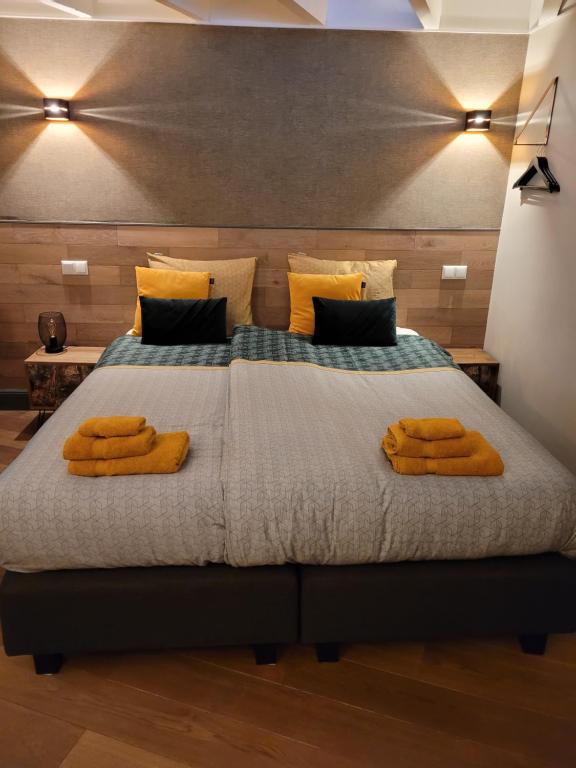 Postel nebo postele na pokoji v ubytování Guesthouse Het Gouden Eiland