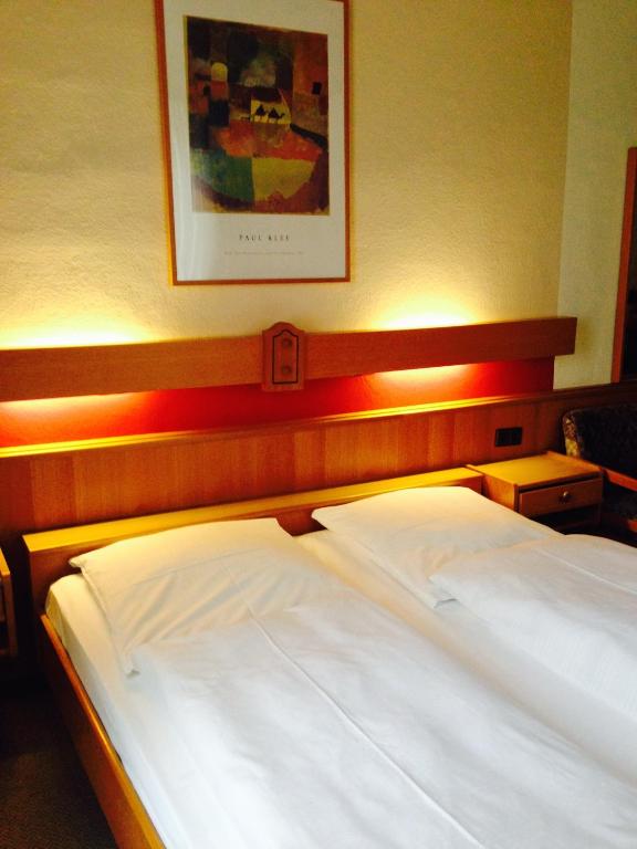 Postel nebo postele na pokoji v ubytování Hotel Cafe Lieb