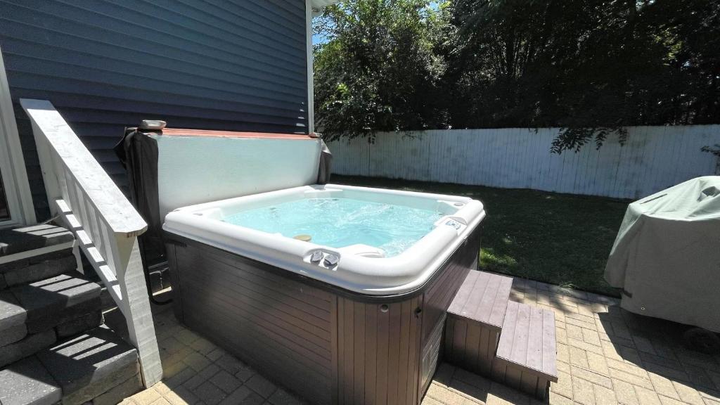 a hot tub in the backyard of a house at The Sands in New Buffalo