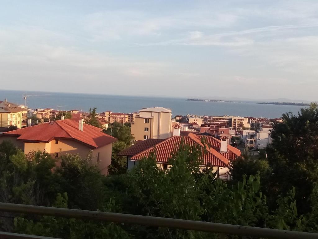 a view of a city with buildings and the ocean at Villa Poliana in Sveti Vlas