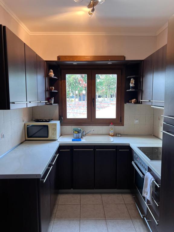 Kuchyň nebo kuchyňský kout v ubytování Joanna Apartment