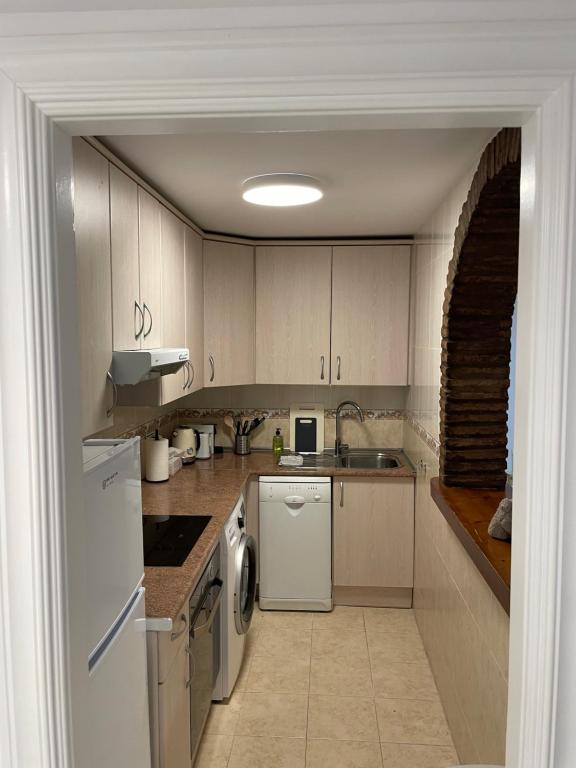 Kuchyň nebo kuchyňský kout v ubytování Jardines Apartment