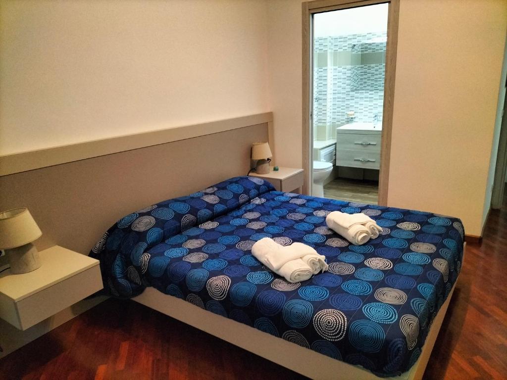 Postel nebo postele na pokoji v ubytování City Center