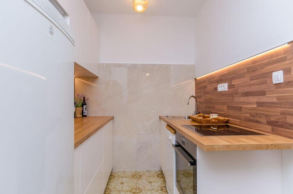 Kuchyň nebo kuchyňský kout v ubytování House Blanka