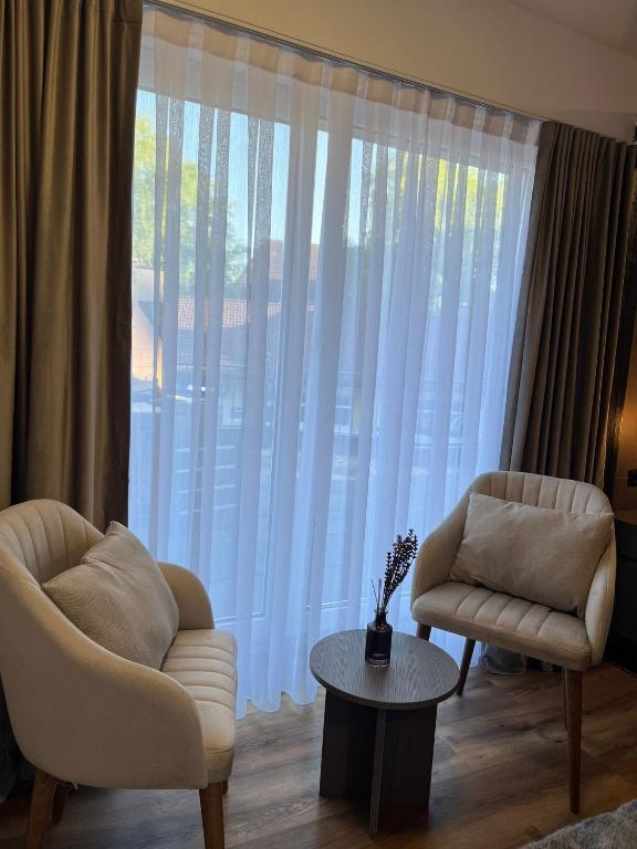 Posezení v ubytování Hotel Harmshof Bispingen