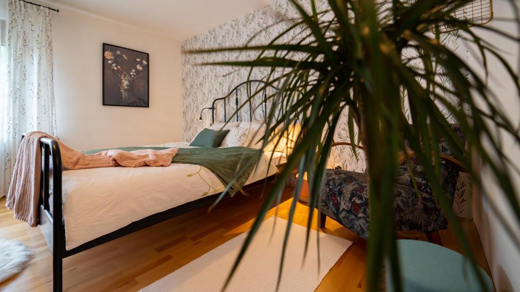 Postel nebo postele na pokoji v ubytování Apartmani Gruzdovo