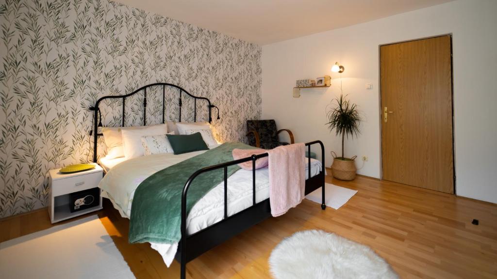 Postel nebo postele na pokoji v ubytování Apartmani Gruzdovo