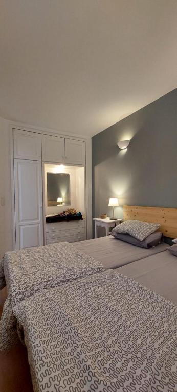 En eller flere senge i et værelse på LA CONDESA APARTAMENTO 7