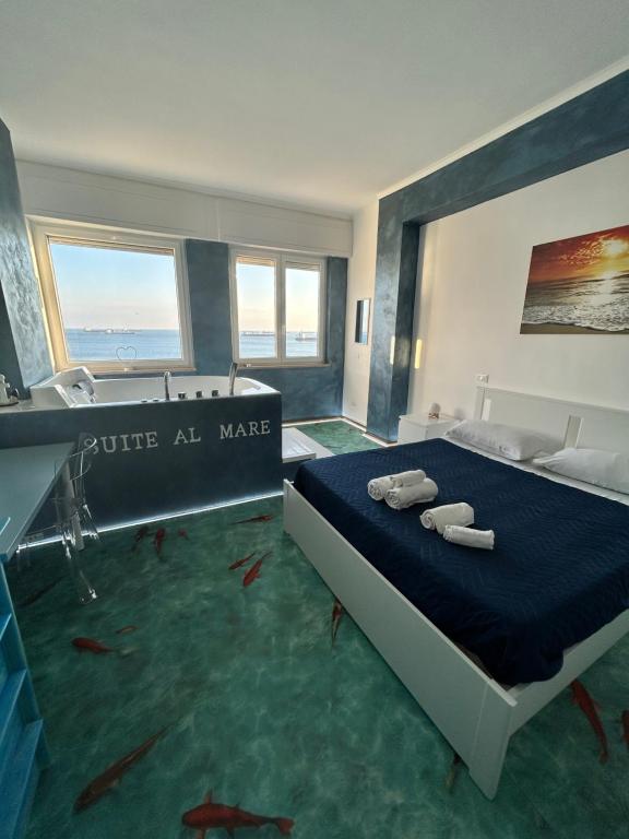 Postel nebo postele na pokoji v ubytování Suite al mare