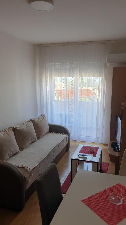 Postel nebo postele na pokoji v ubytování Apartmani Borko 3-2