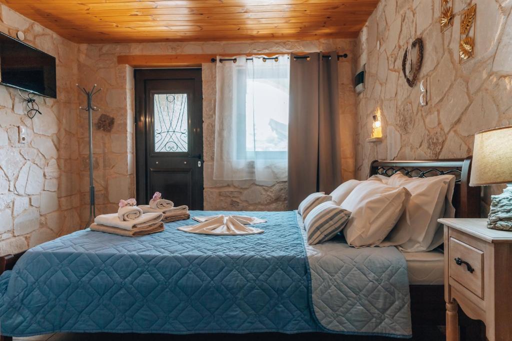 Posteľ alebo postele v izbe v ubytovaní Villa Stafidaki