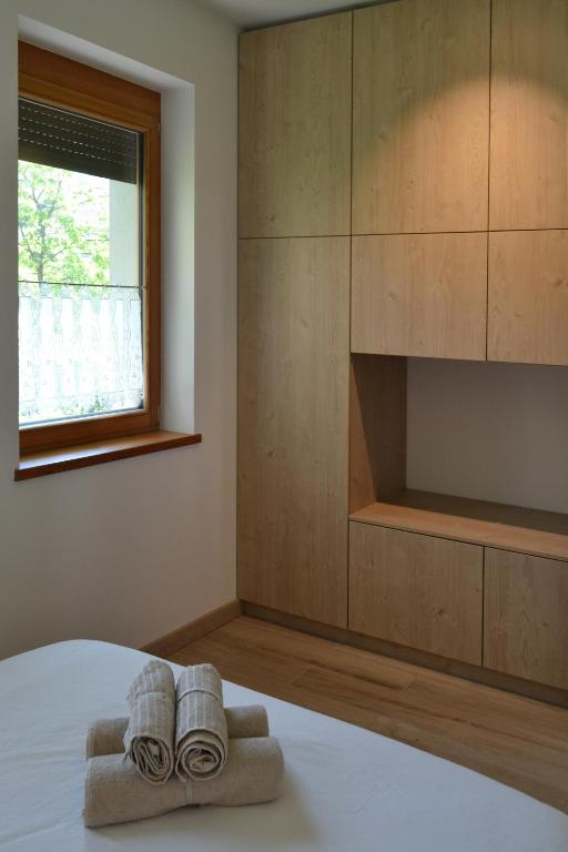 Postel nebo postele na pokoji v ubytování APARTMA VODNIK