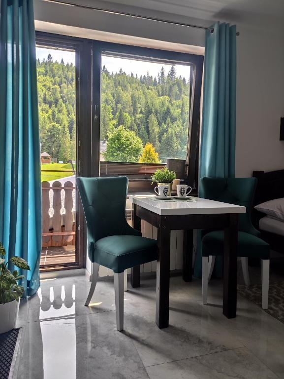 Posedenie v ubytovaní Pokoje i apartamenty u Sabiny - DOSTĘP DO JACUZZI TYLKO W WYBRANYCH OPCJACH sprawdź poniżej szczegóły rezerwacji